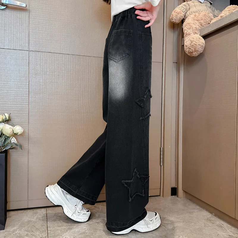 エレガントな子供黒色ジーンズ女の子のためのカジュアルストリートスタイルデニムパンツティーンエイジャー子供ファッションストレートジーンズズボンとスター