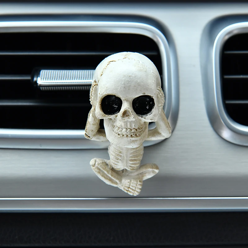 Creative Car Skull Ornaments with the Design of 'See No Evil, Hear No Evil, Speak No Evil', Which Are Car Interior Decorations.