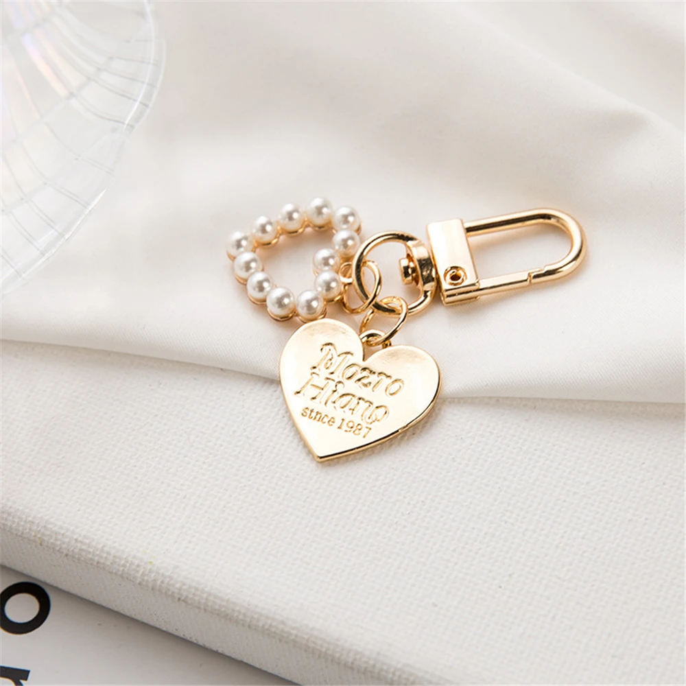 Creative Alloy Shell Pearl Key Chain for Women Cute Conch Pendant Keyring Handbag Ornament Car Key Accessories Small Gifts view 5