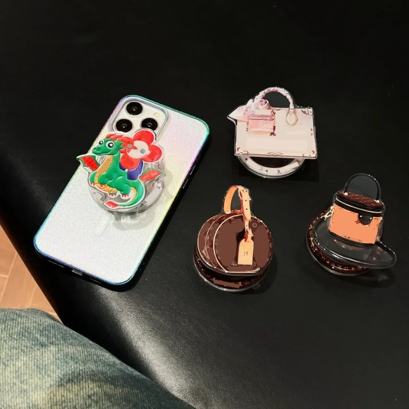 

Light Luxury High-end Strong Magnetic Mobile Phone Stand Holder Trend MagSafe Mobile Phone Accessory Classic Fashion Phone Grip