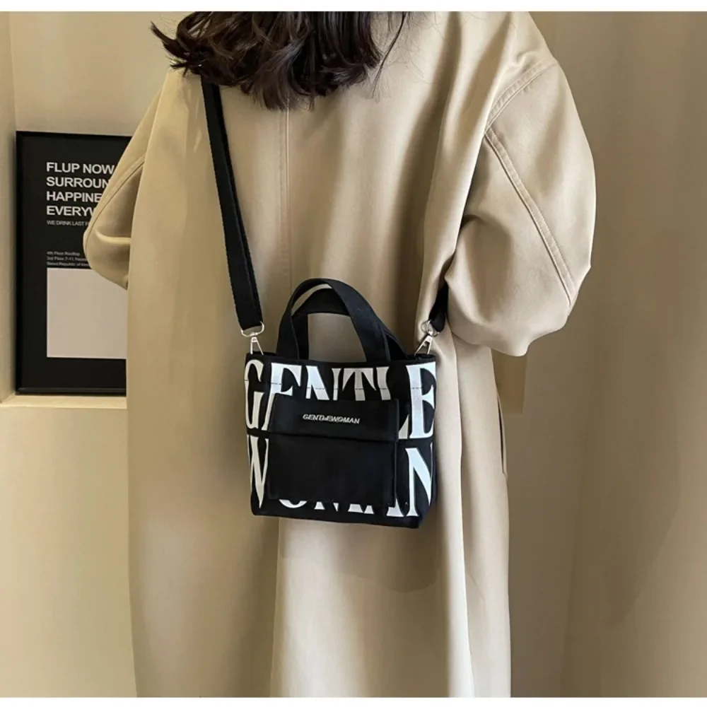 حقيبة كتف للنساء من القماش بلون سادة حقيبة ساعي البريد حقيبة حمل عصرية مطبوعة بحروف كاجوال حقيبة كروس ذات سعة كبيرة #2