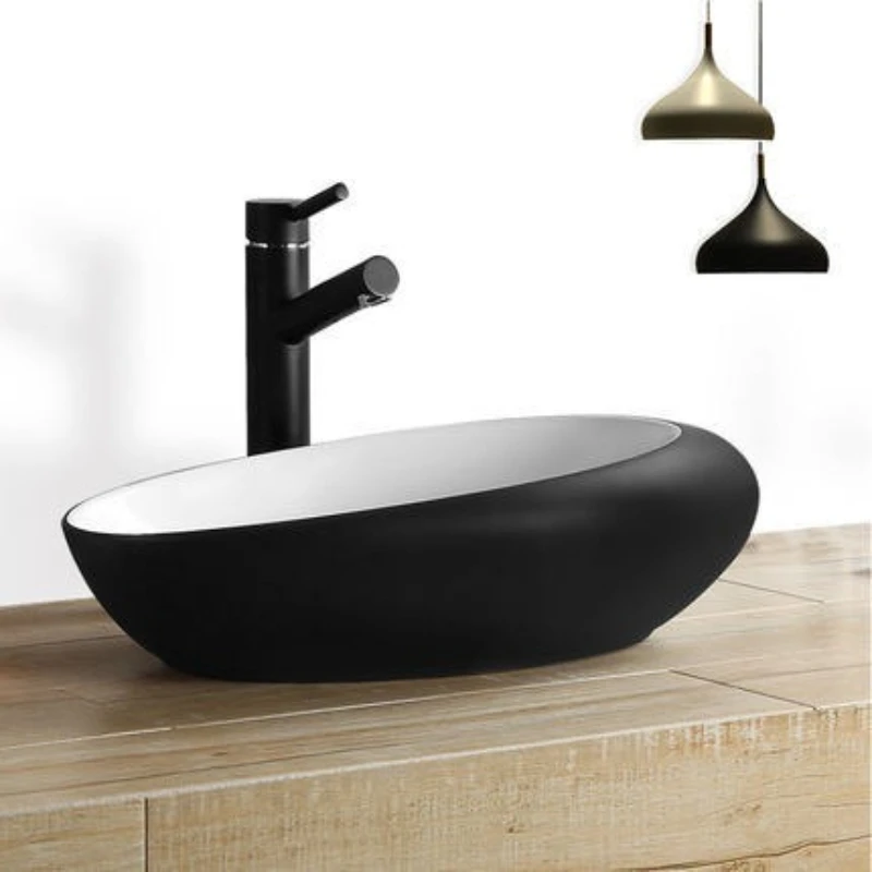 

Art basin basin on the table, wash ceramic black and white oval household bathroom special-shaped personalized large