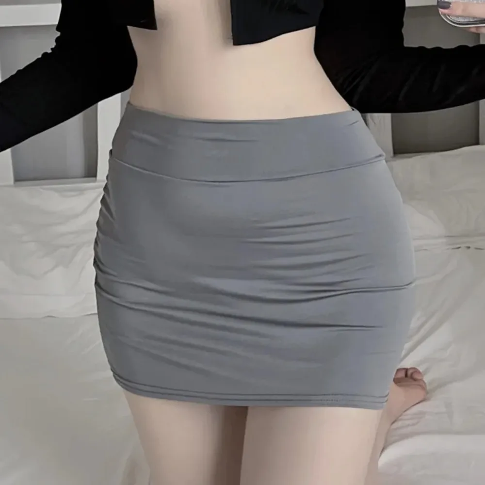 Sexy Thin Skinny Mini Skirt Without Lining Solid Color Low-rise See-through Hip Lifting Short Skirt Women Clubwear