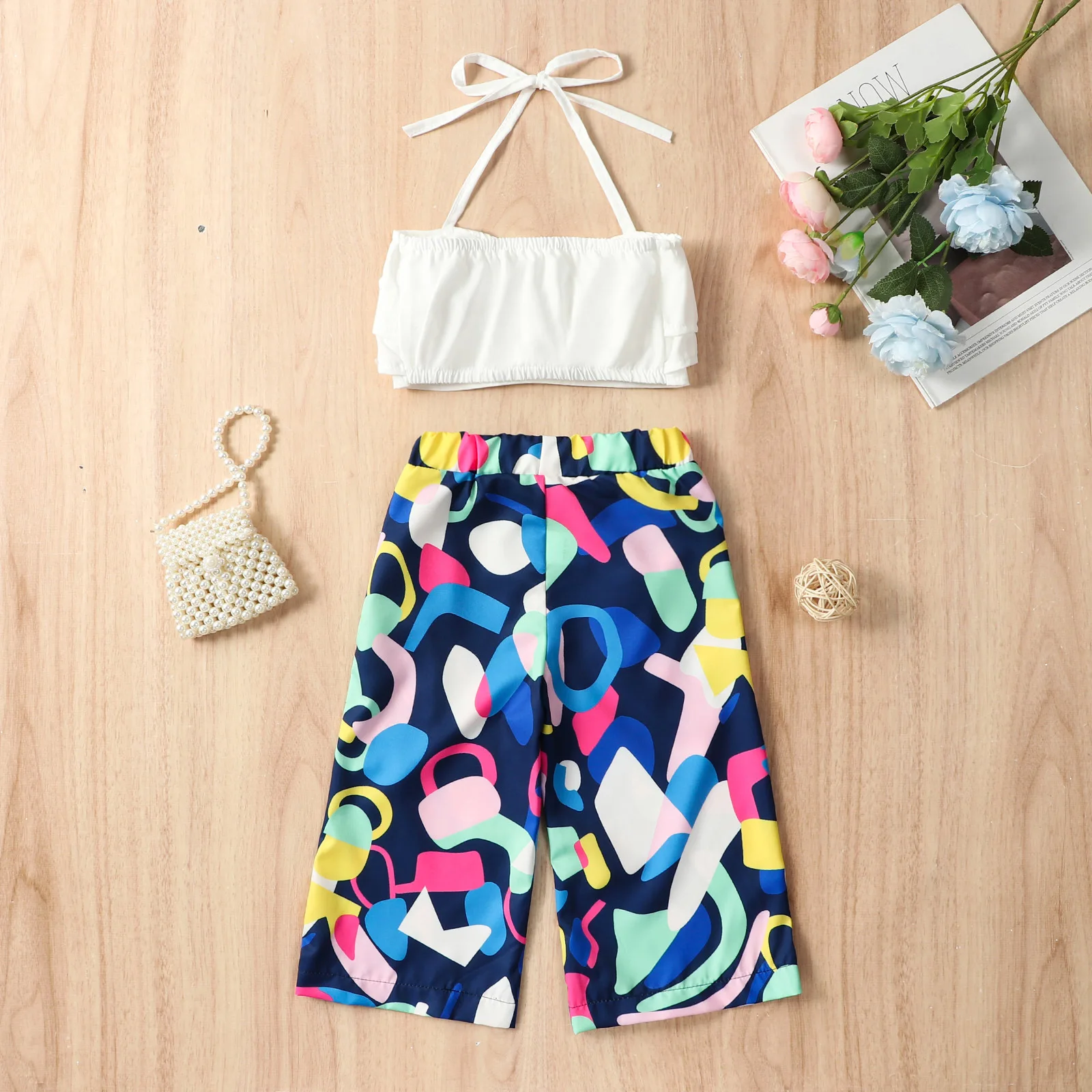 Conjuntos de ropa de verano para niñas pequeñas, Top corto blanco sólido sin mangas con cuello Halter, pantalones sueltos estampados, ropa para niños pequeños