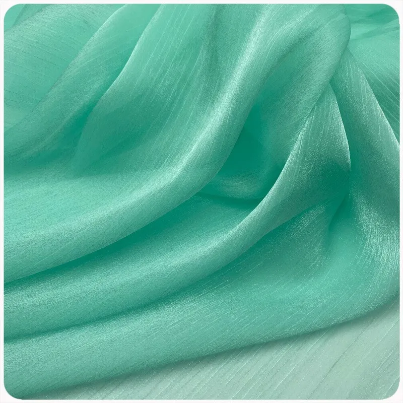 

Ice flower crepe cationic yarn bright silk organza fabric glittering silver shirt dress Hanfu