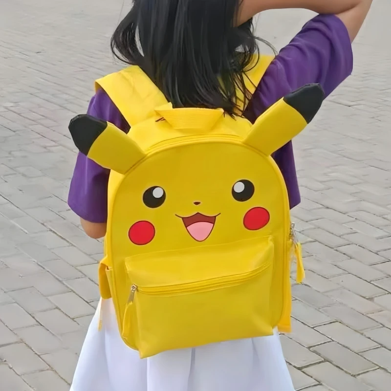 男性と女性のための黄色のポケモンバックパック,ピカチュウのランドセル,大容量のアニメ周辺機器バッグ,子供のためのレジャーバッグ,新しい