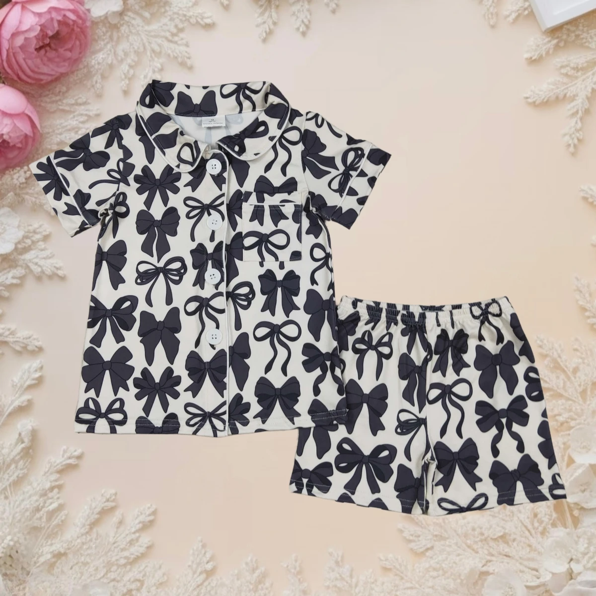 

Toddler Girl Summer Pajamas Set Baby Black Bows Print Button-Down Lapel Pocket Short Sleeve Tops and Shorts Loungewear 2Pcs Sets
