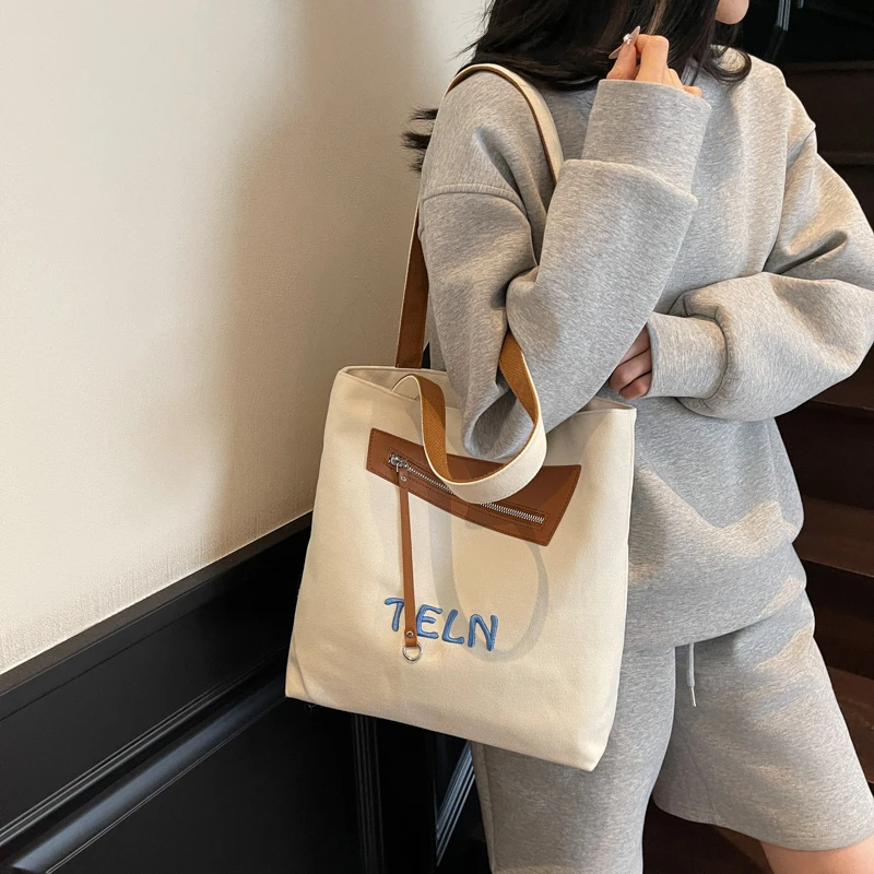

Fashion New Women's Simple Casual Large Capacity Single Shoulder Tote Bag Outdoor Trend Versatile Commuting Storage Bags