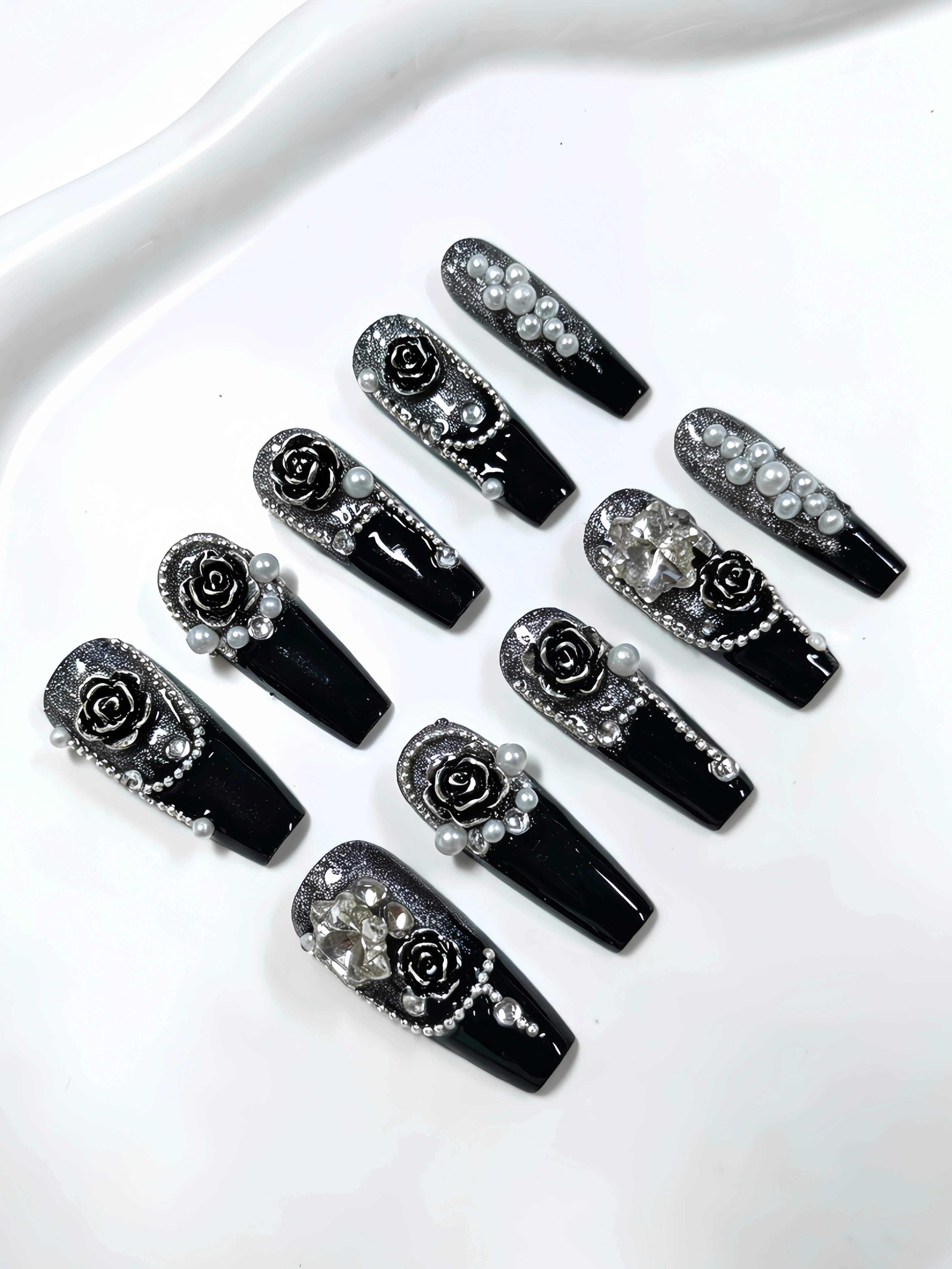 10 Long Trapezoidal Press-On Nails, with Black Silver Glitter as the Main Color, Embellished with Gradient Camellia Chain, Pearls, Rhinestones, and Other Elements, Y2K Dark Gothic Style Nail Stickers, Suitable for Students, Office Workers, Sweet Cool Girls, and Hot Girls for Daily Outings, Workplace, Bars, Clubbing, Music Festivals, and Other Activities, Includes One Jelly Glue and One Nail File
