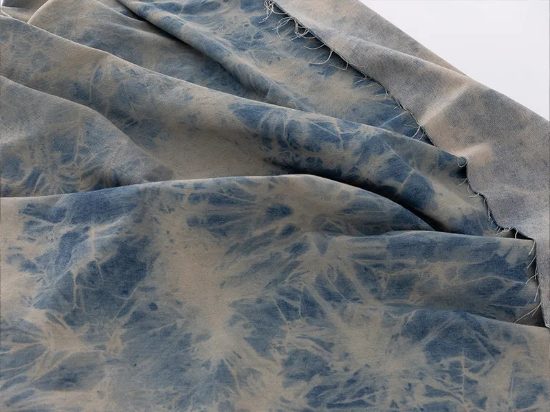 Faded Tie Dye Denim Designer Fabric with Multi Step Sand Washed Surface for Utility Vest Creation and Expressive Runway Styling