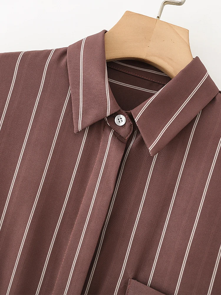 Kemeja wanita bergaya Eropa, serbaguna, elegan, kasual, lengan panjang, bergaris, dengan saku dan kerah.