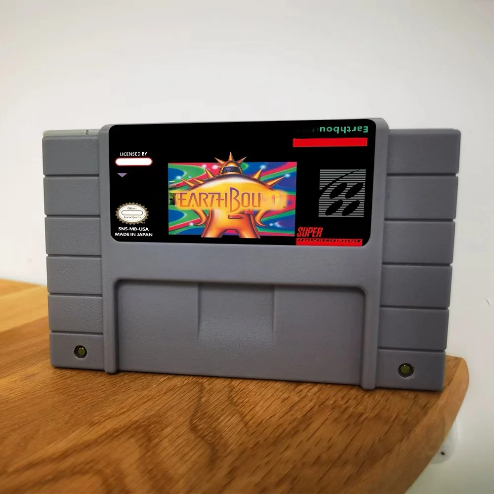 خرطوشة RPG Game Earthbounded 16 بت USA/EUR/JAP الإنجليزية الإسبانية والفرنسية والألمانية المتاحة لوحدات تحكم ألعاب الفيديو SNES