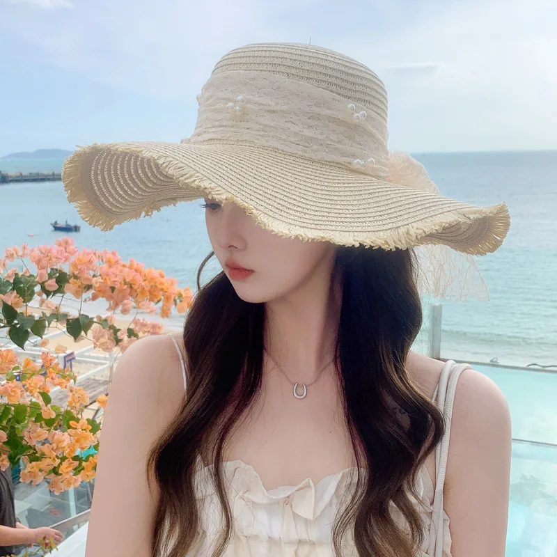 

Summer new women's hat high-grade with ribbons and pearls beach straw hat sunscreen and shading breathable and large-brimmed