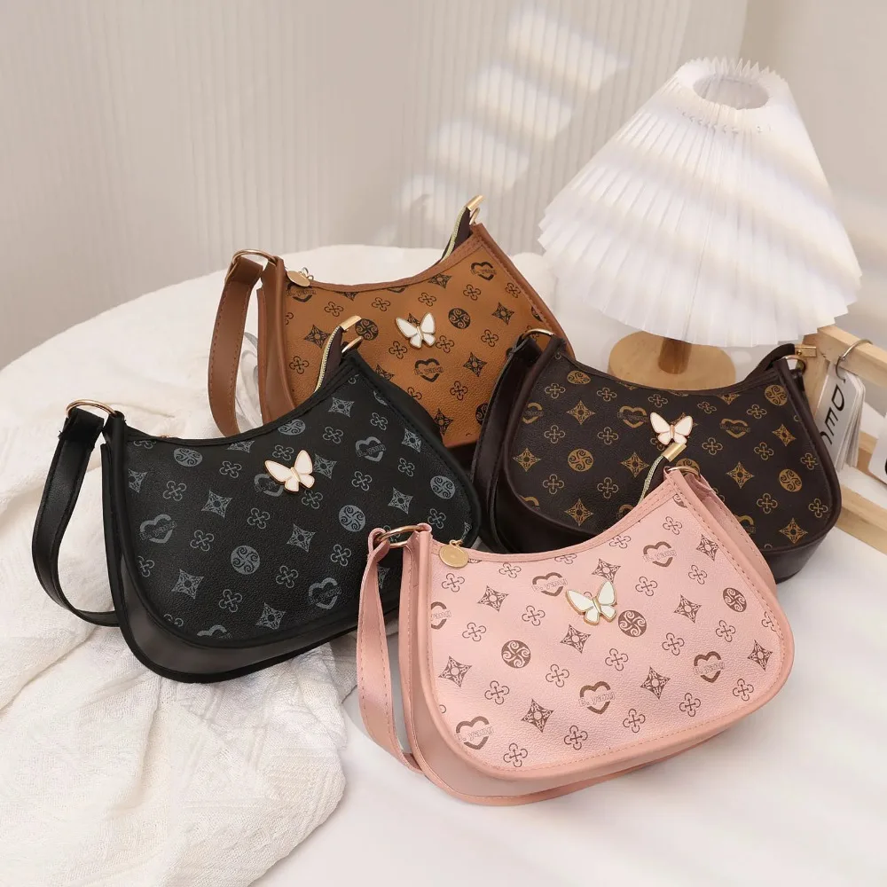 

Новинка 2025 года, женская сумка премиум-класса на плечо с принтом в виде полумесяца и украшением в виде бабочки, роскошная женская сумка подмышками