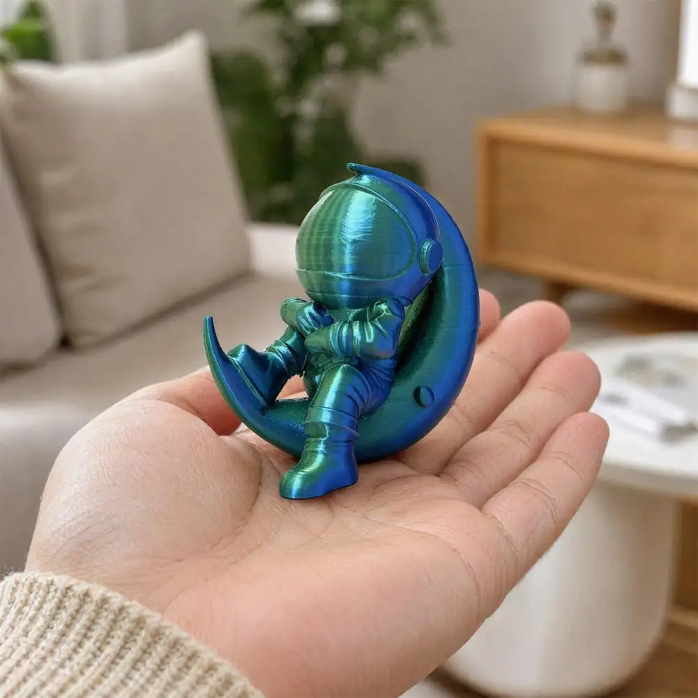 3D Printed Moon Astronaut Figurine, Sitting on Crescent Moon Spaceman Statue, Astronaut Desktop Decoration for Home Office Books
