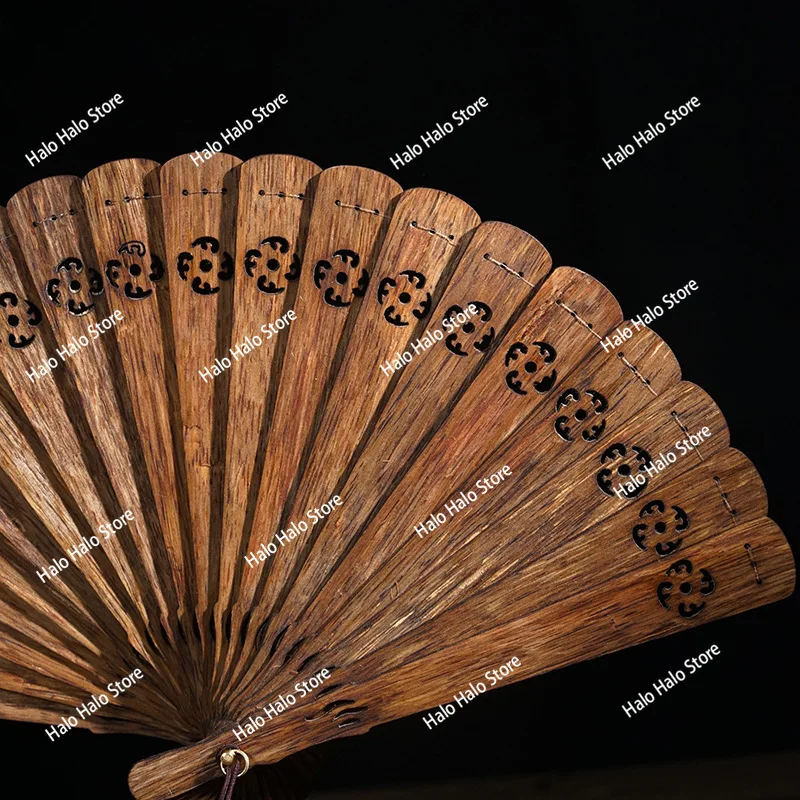 Agarwood folding fan high grease black oil old material hollow fan retro craftsmanship ornament national style gift
