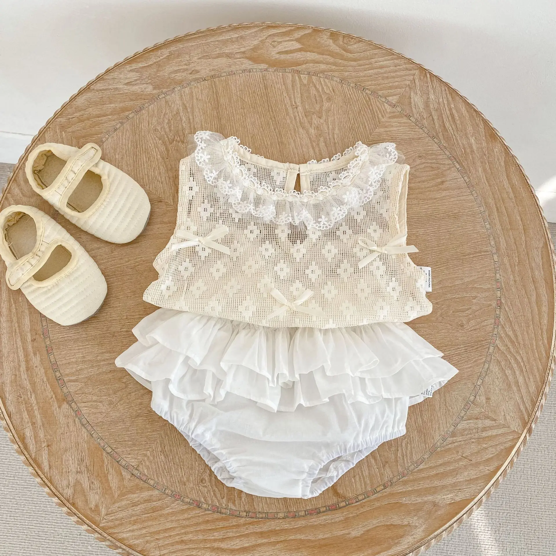 2026 New Baby Clothes for Summer Girls Baby Sweet Princess Bow Hollow Vest Cake Bag Fart Skirt Two Piece Set
