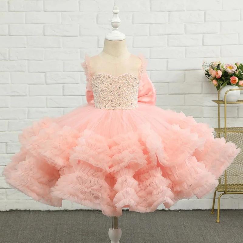 

Flower Girl Dresses Blush Tulle Puffy Tiered Pearls With Bow Sleeveless For Wedding Birthday Party Holy Communion Gowns