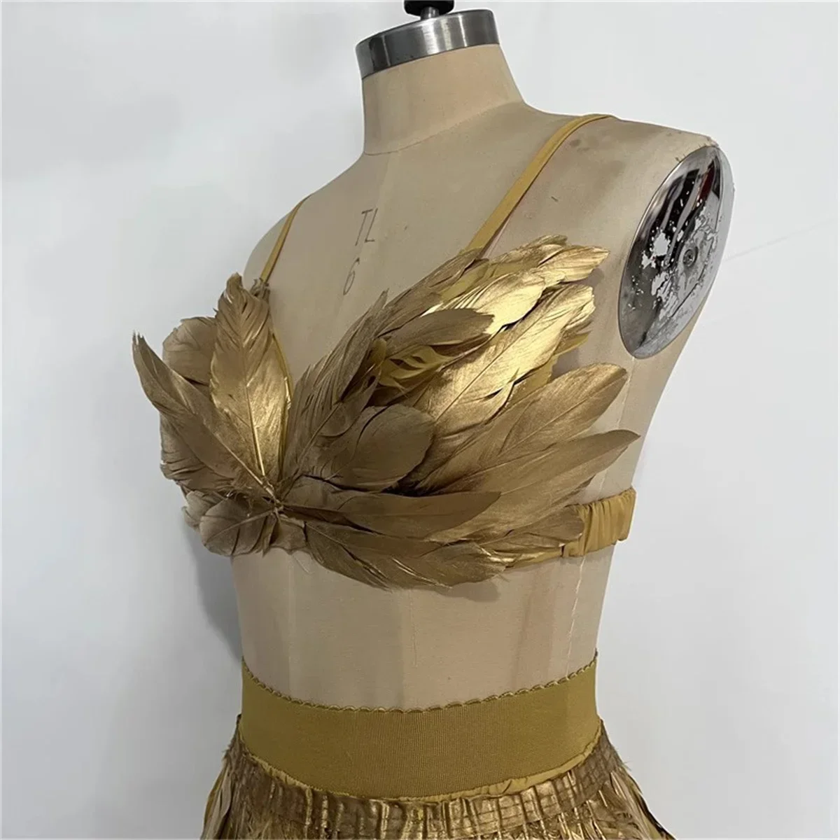 Fashion gold feather shawl skirt set, women's sexy stage wear, performance runway clothing accessories, European and American st