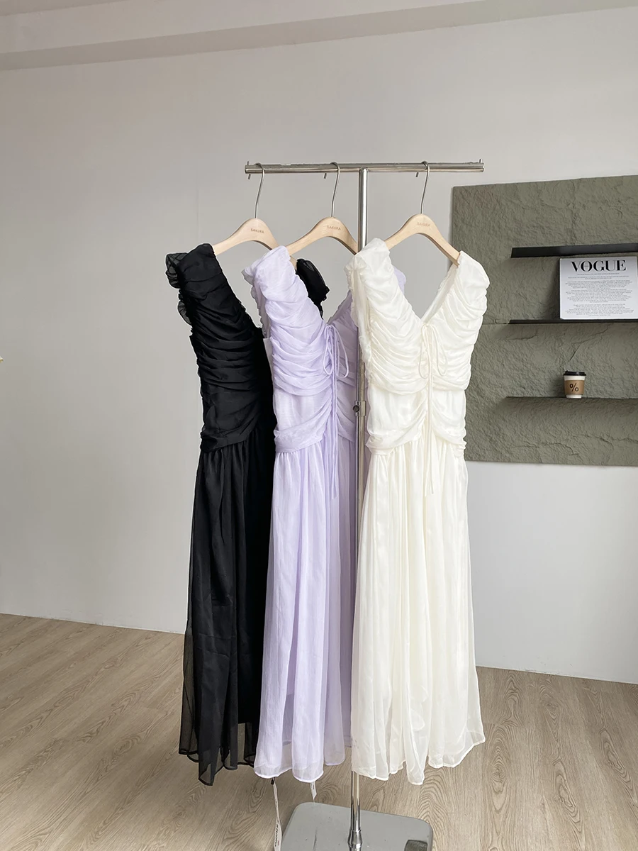 فستان نسائي صيفي أنيق بياقة على شكل V بدون أكمام مكشكش فستان طويل للسيدات بلون سادة وأربطة على شكل حرف A