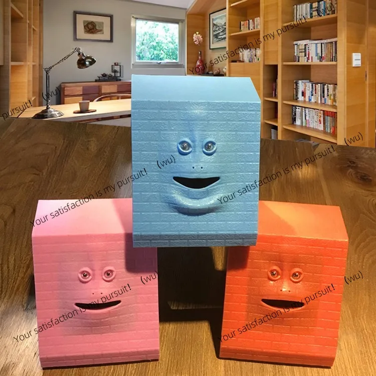 وجه مبتكر على شكل حصالة على شكل خنزير يستشعر الوجه الذي يتحرك عند تناول الأموال، يمكن أن يتحرك فم وجه القرد على شكل خنزير