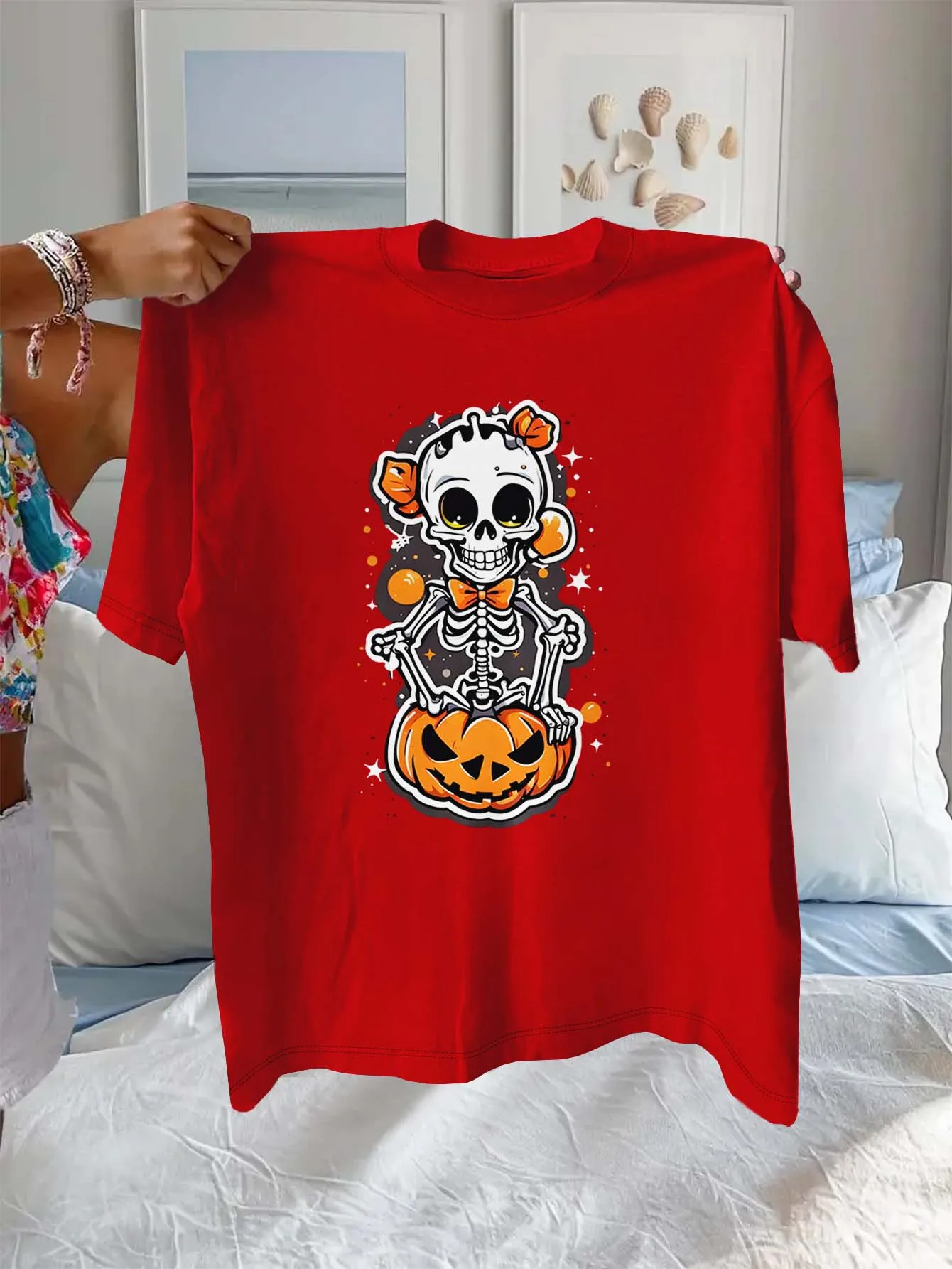 

Очаровательный скелет больших размеров с тыквенным бантом, модный топ