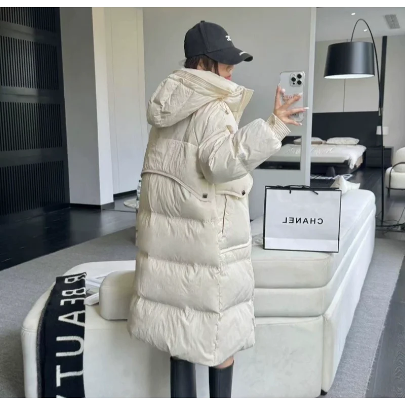 Chaqueta larga de plumón para mujer, moda de invierno 2025, estilo viajero, abrigo cálido adelgazante versátil y grueso elegante a la moda