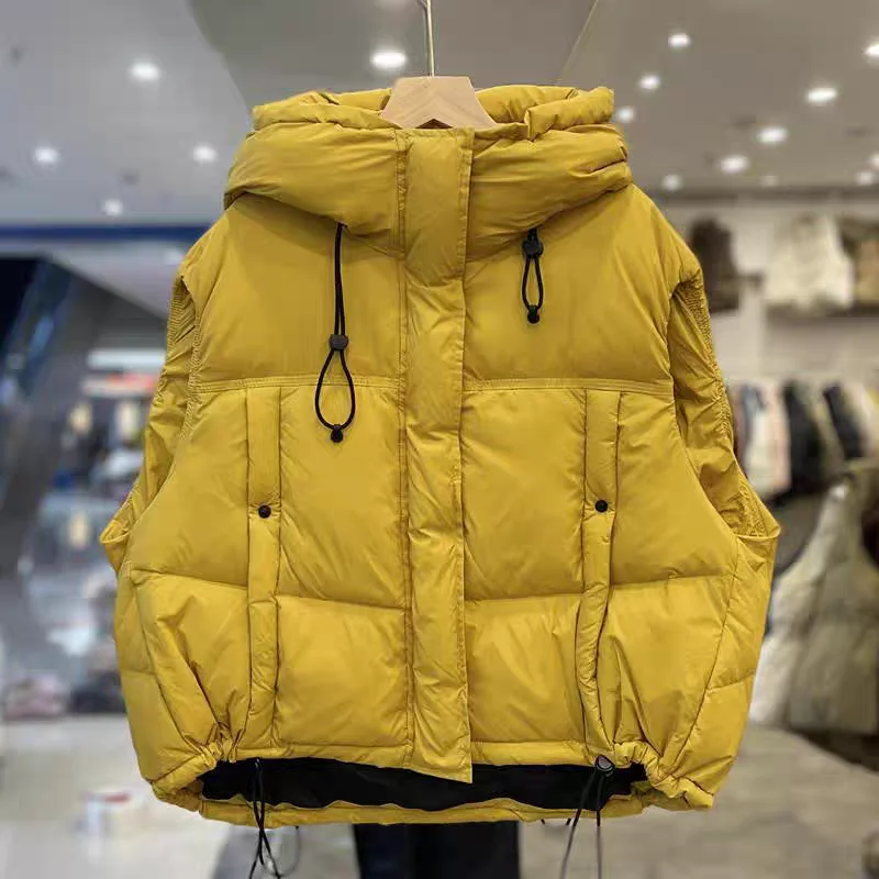 

2025 Европейский осенне-зимний новый женский пуховый жилет, свободный короткий жилет с капюшоном на белом утином пуху