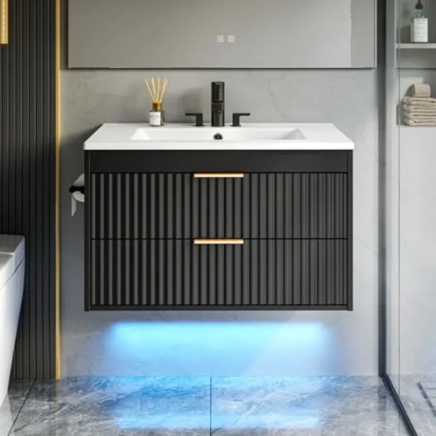 Floating sink and towel holder combo for modern bathroom: fluted metal cabinet in matte black, LED light, soft-closing drawers,