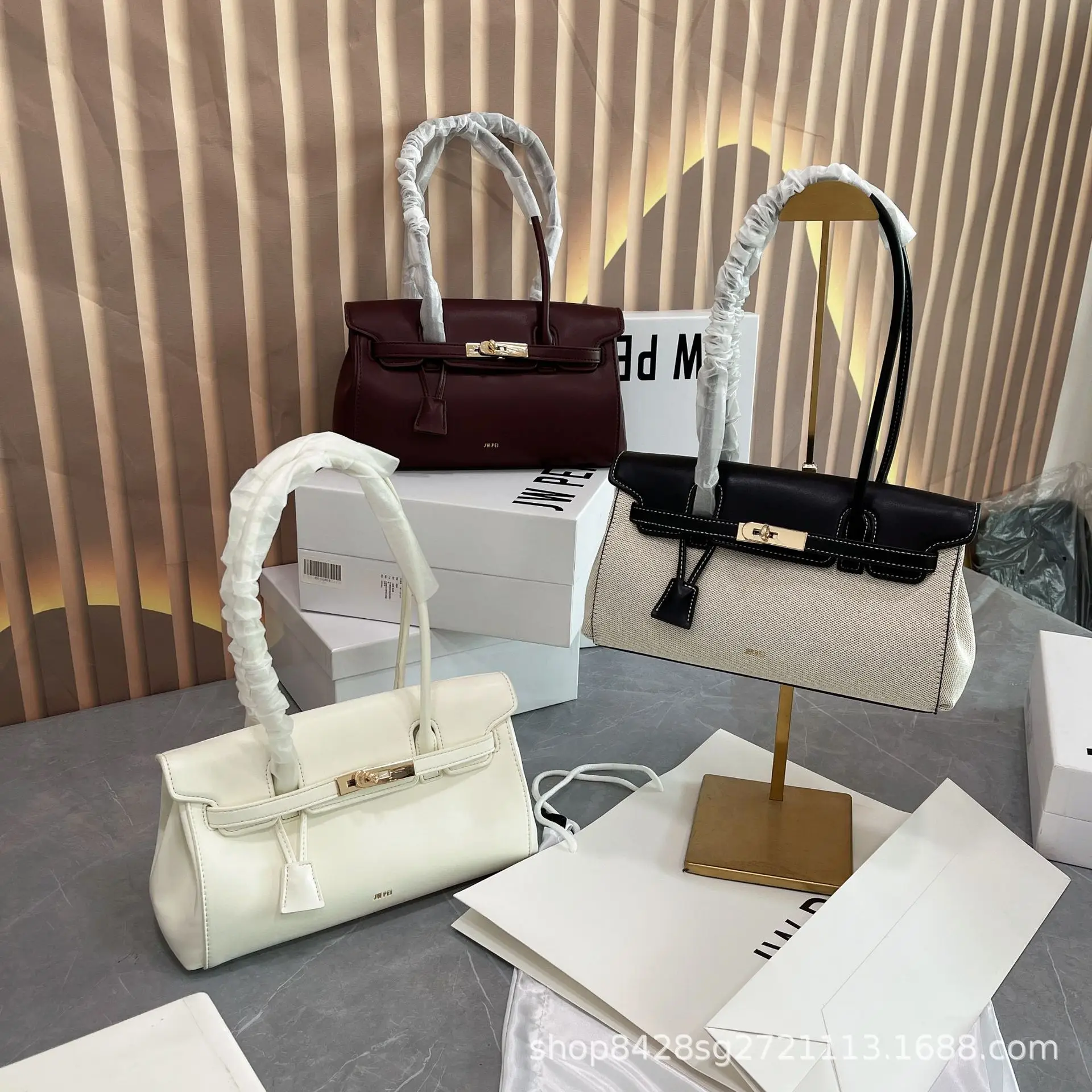French JWPEI baguette bag 2025 new style briefcase handbag messenger bag niche design lock female bag