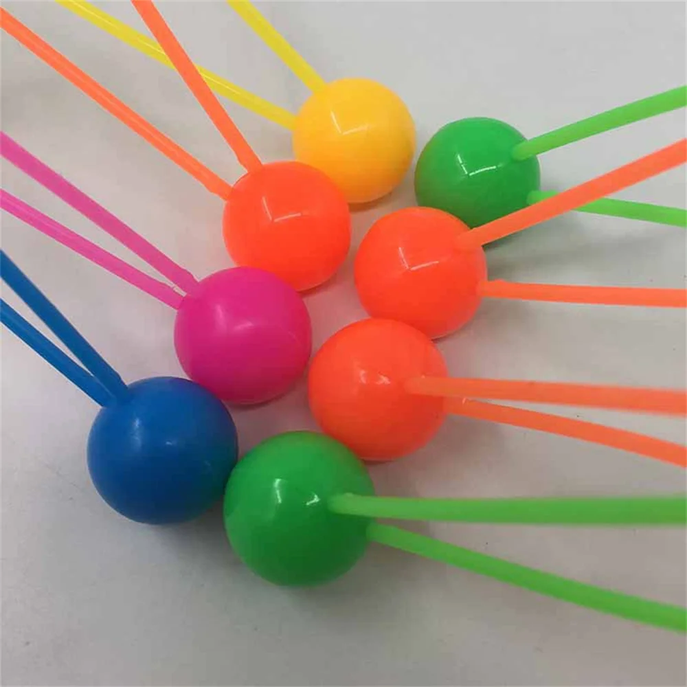 Pelota que rebota para ejercicio de manos, doble toque, fácil de usar, juego Simple, exquisito y lindo, agarre cómodo, juegos divertidos de equilibrio de mano