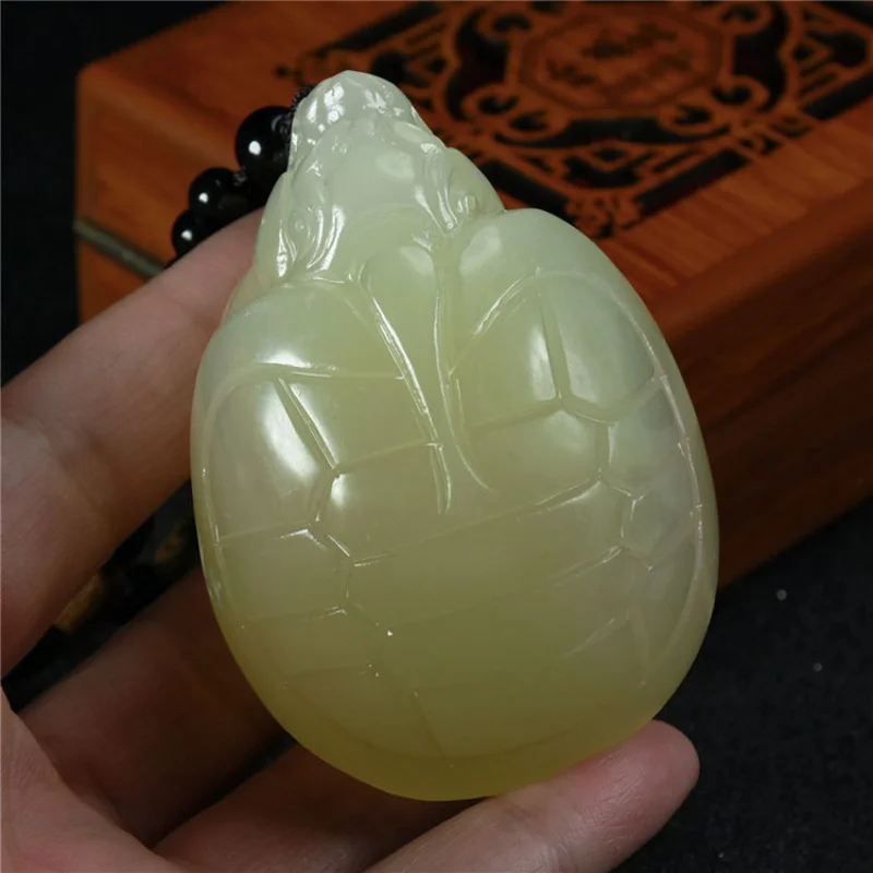Afghan large hand-carved jade pendant featuring Pixiu,,, Buddha, and cabbage motifs