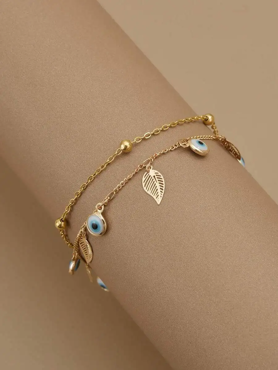 

Stainless Steel Dual-Layer Bracelet With Hollow Leaf And Evil Eye Charms For Women Beach Jewelry
