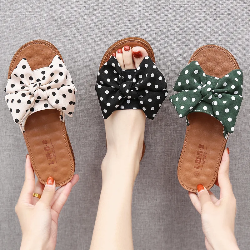 

Custom. Beef Tendon Soft Bottom Bowknot Outer Wear Flat Slippers Women 2025 Summer New Shoes Word Casual Beach Sandals
