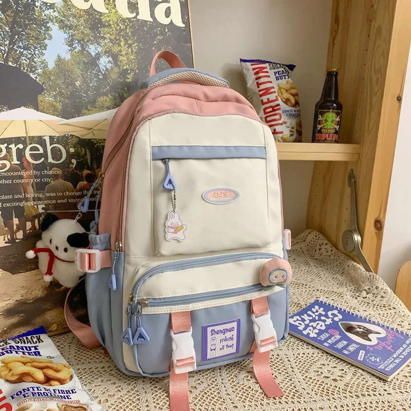 Mochila escolar para estudiantes de escuela primaria, Color de contraste, alivio de carga versátil, nueva