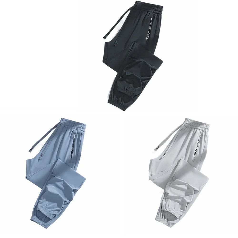 ملابس رياضية سراويل رياضية من الحرير الجليدي فضفاضة بجيب بسحاب سراويل للجري قابلة للتمدد وقابلة للتنفس سراويل لياقة بدنية