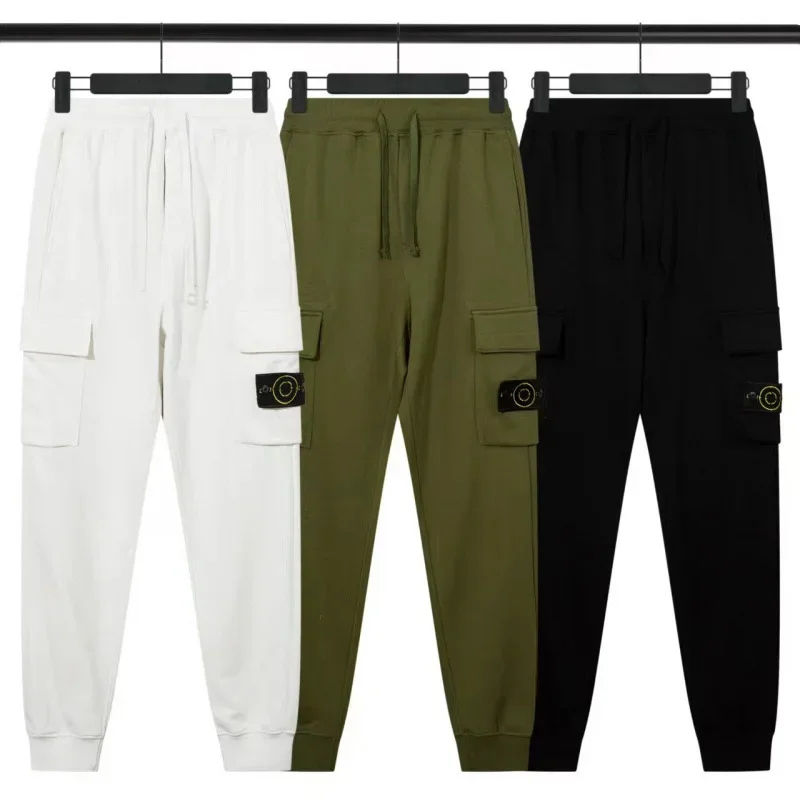 Pantalones largos informales de punto de algodón para deportes al aire libre, bolsillo con cremallera, insignia de brújula multifuncional, pantalones de ocio para hombres y mujeres