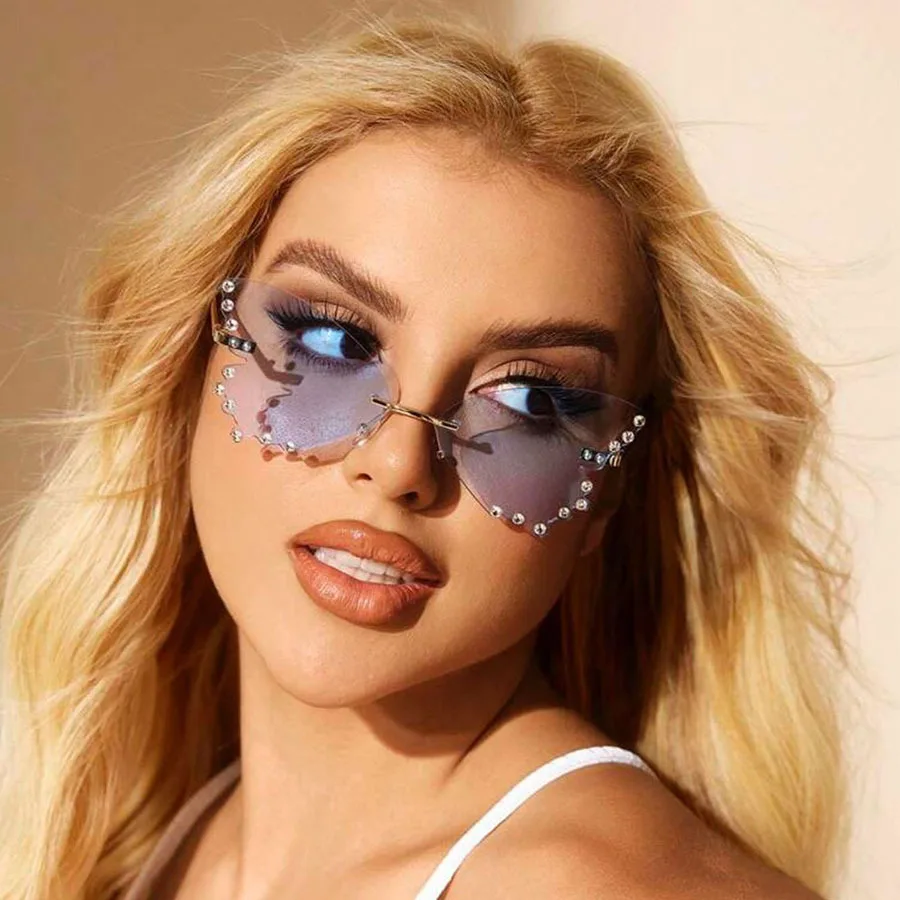 

2024 new cross-border rimless butterfly diamond sunglasses female ins fashion personality photo sunscreen sunglasses