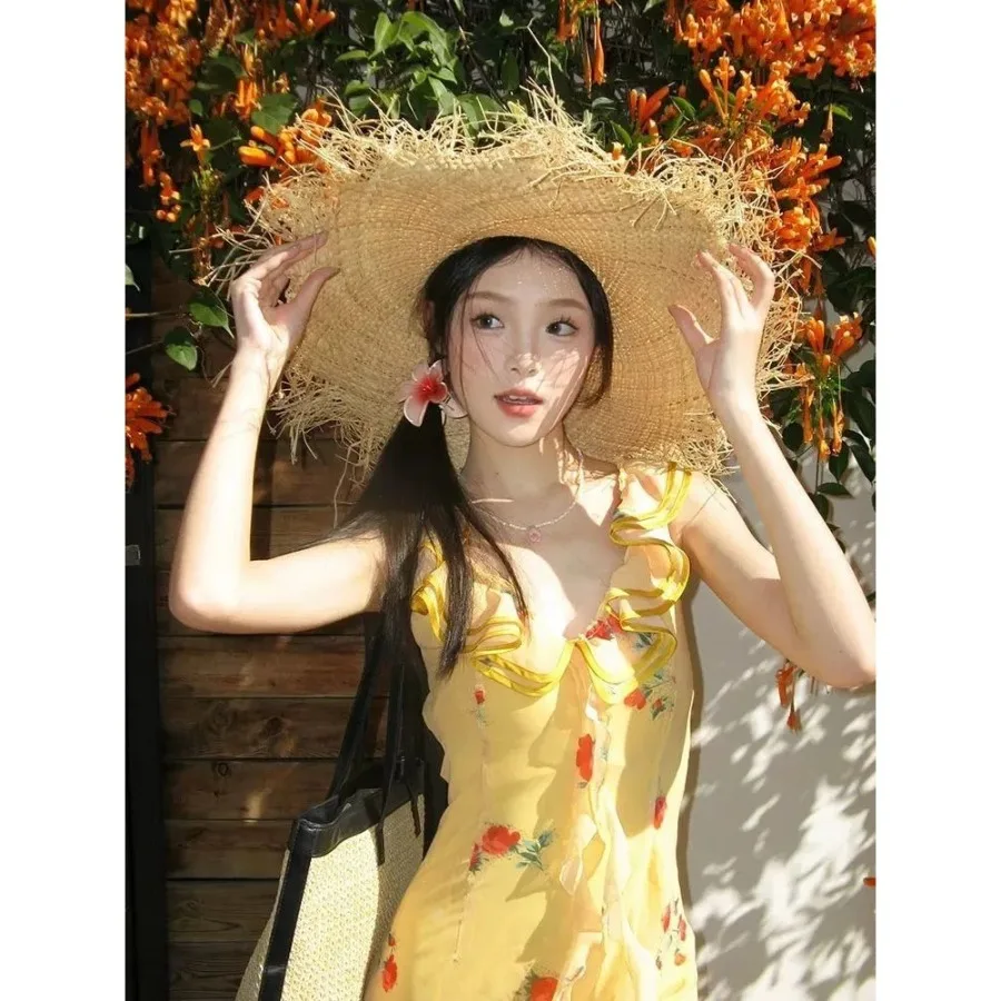 

【New style】Yellow lotus leaf beautiful floral suspender dress for women summer vacation French summer temperament beach fishtai