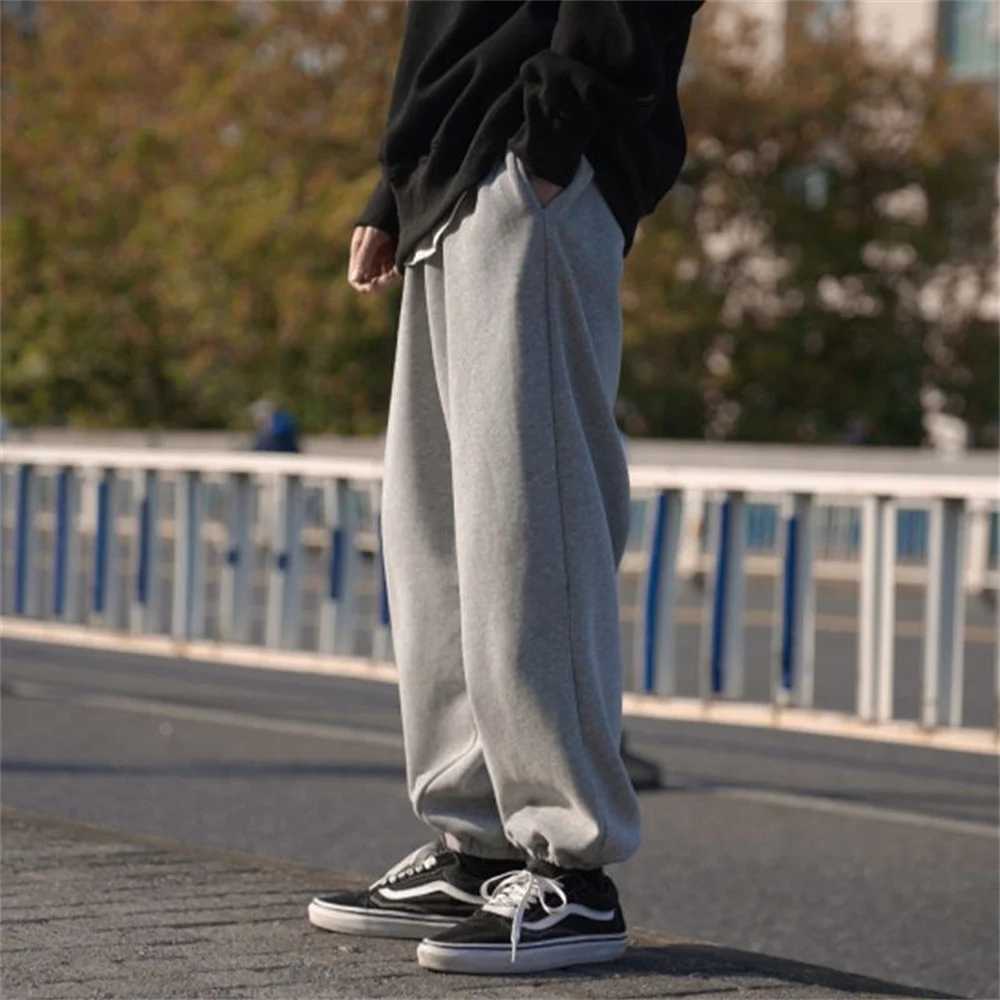 Casual Gray Sweatpants Loose Fit Joggers Mid Seam Design Elastic Cuff Streetwear Fleece Lined Sport Pants for Daily Wear Workout