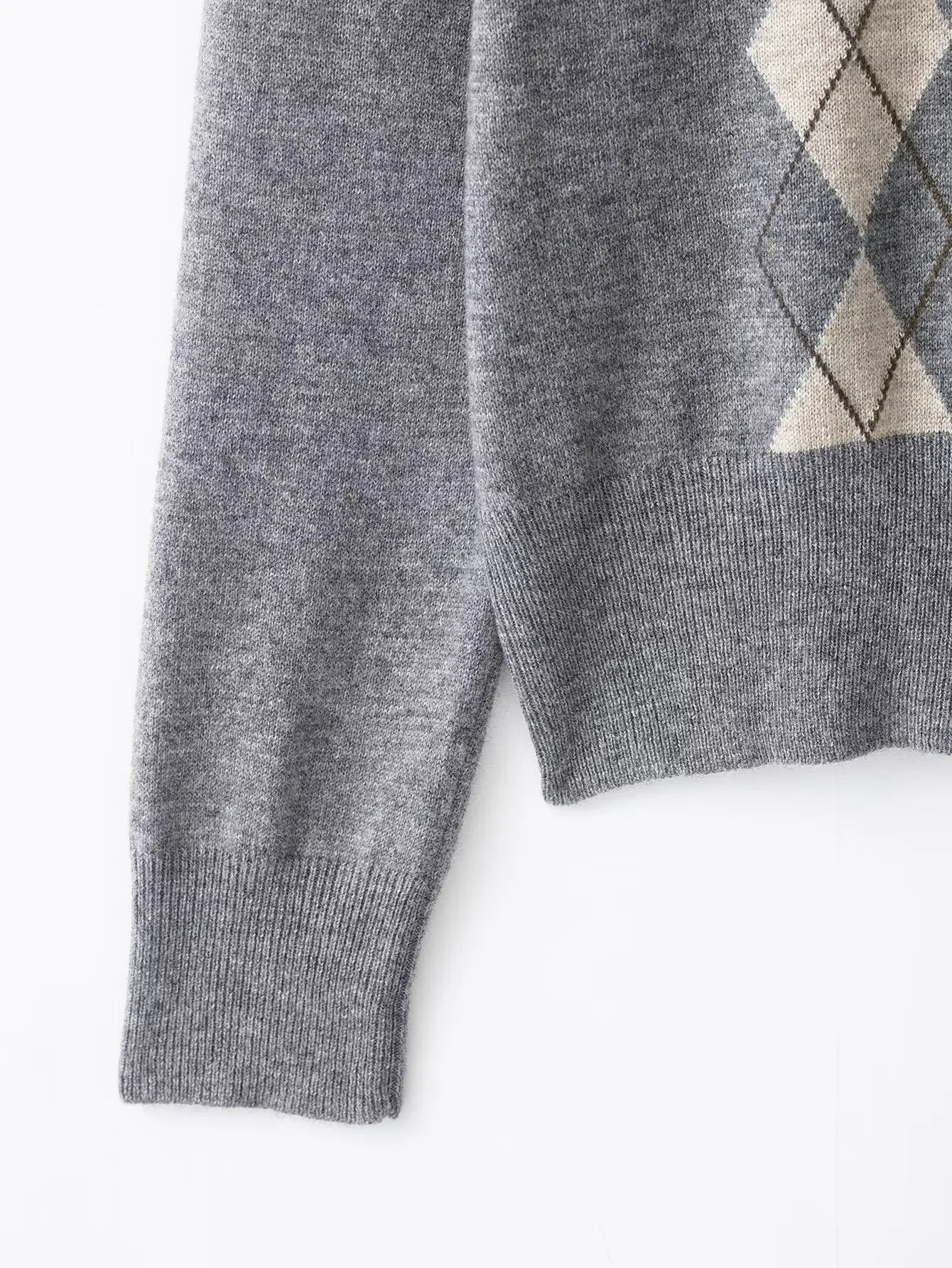 Nieuwe herfstvest voor dames Stijlvolle knoopsluiting V-hals Lange mouwen Slim-fit gebreide geruite trui Streetstyle damestop