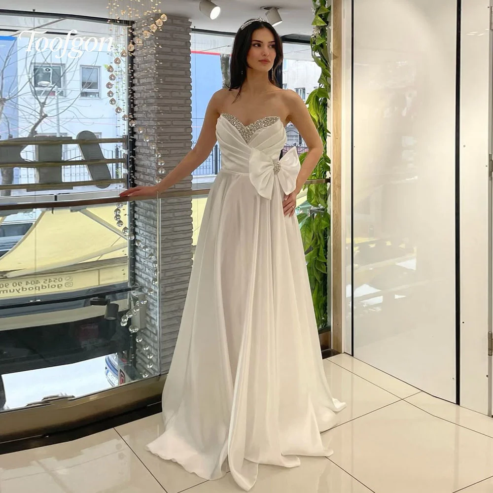 

Toofgon Customized A Line Satin Long Evening Dresses Crystal Beaded Women Prom Gowns Bow Special Occasion Formal Party Dress