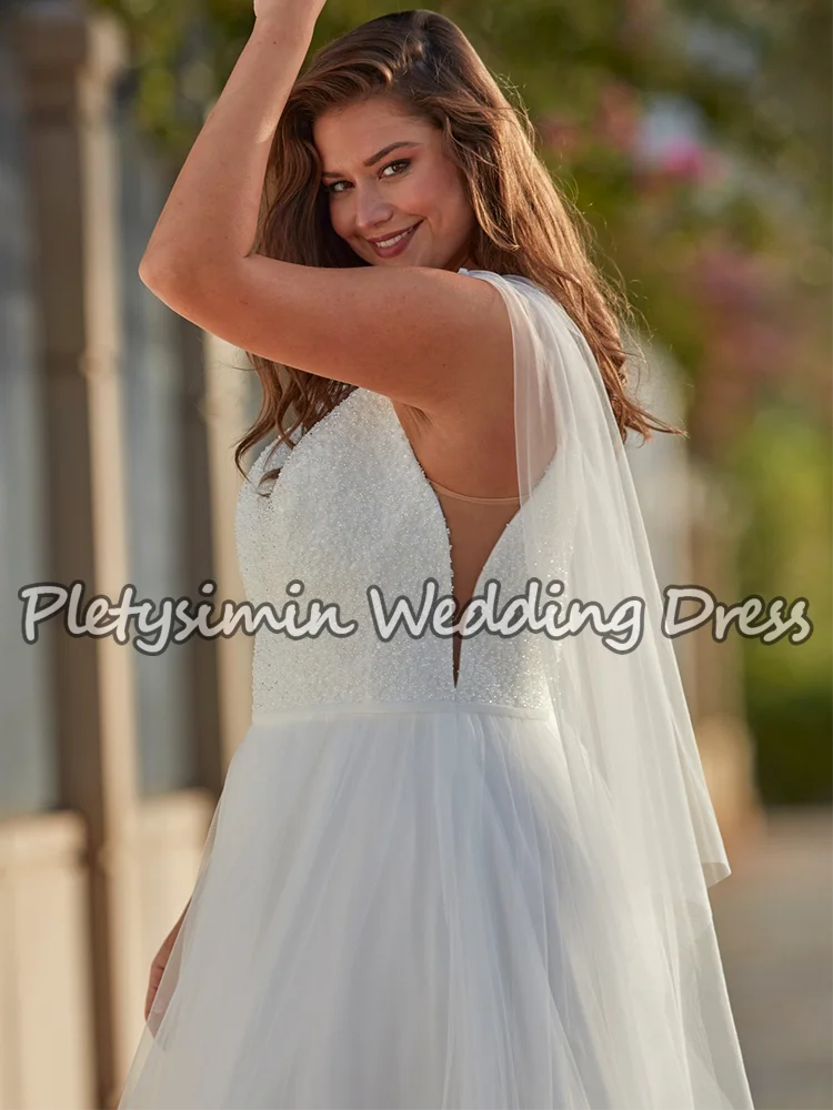 럭셔리 플러스 사이즈 웨딩 드레스 비즈 장식 스파게티 스트랩 딥 V 튤 케이프 신부 드레스 우아한 베스티도 데 노비아 맞춤 제작