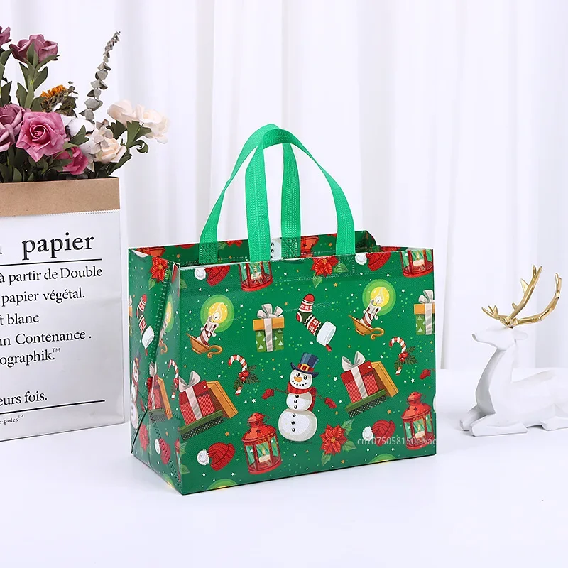 Borsa regalo di Natale Borse tote con fiocco di neve alce di Babbo Natale Borsa per imballaggio regalo di caramelle Borse impermeabili stampate in tessuto non tessuto addensato Regalo di Natale