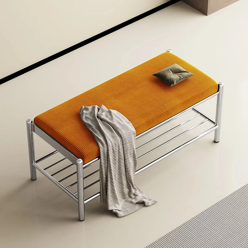 Orange corduroy shoe changing stool, bench