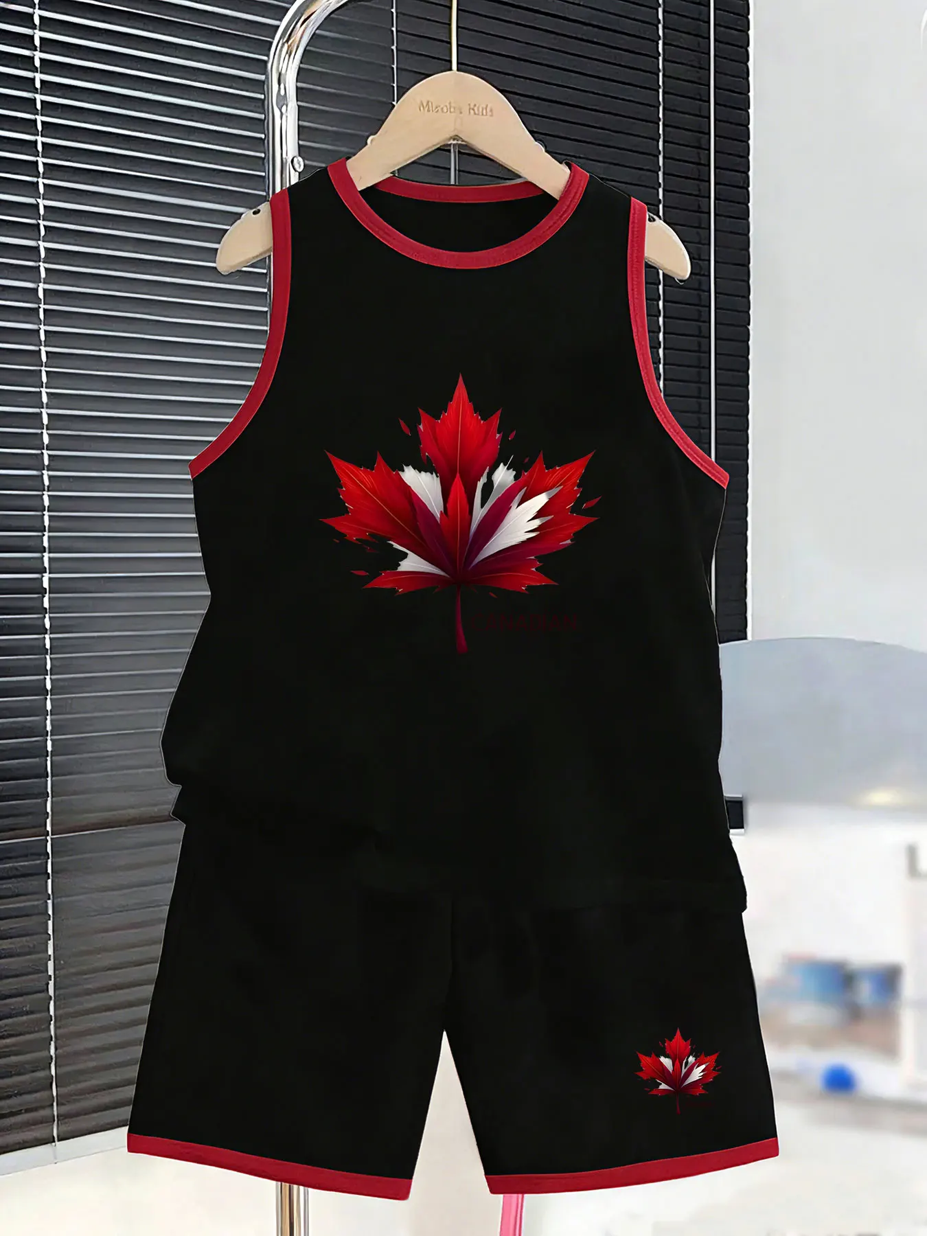 Boys' Canadian Maple Leaf-themed Tank Top and Shorts Set, creating a distinctive summer look. Made from selected skin-friendly a
