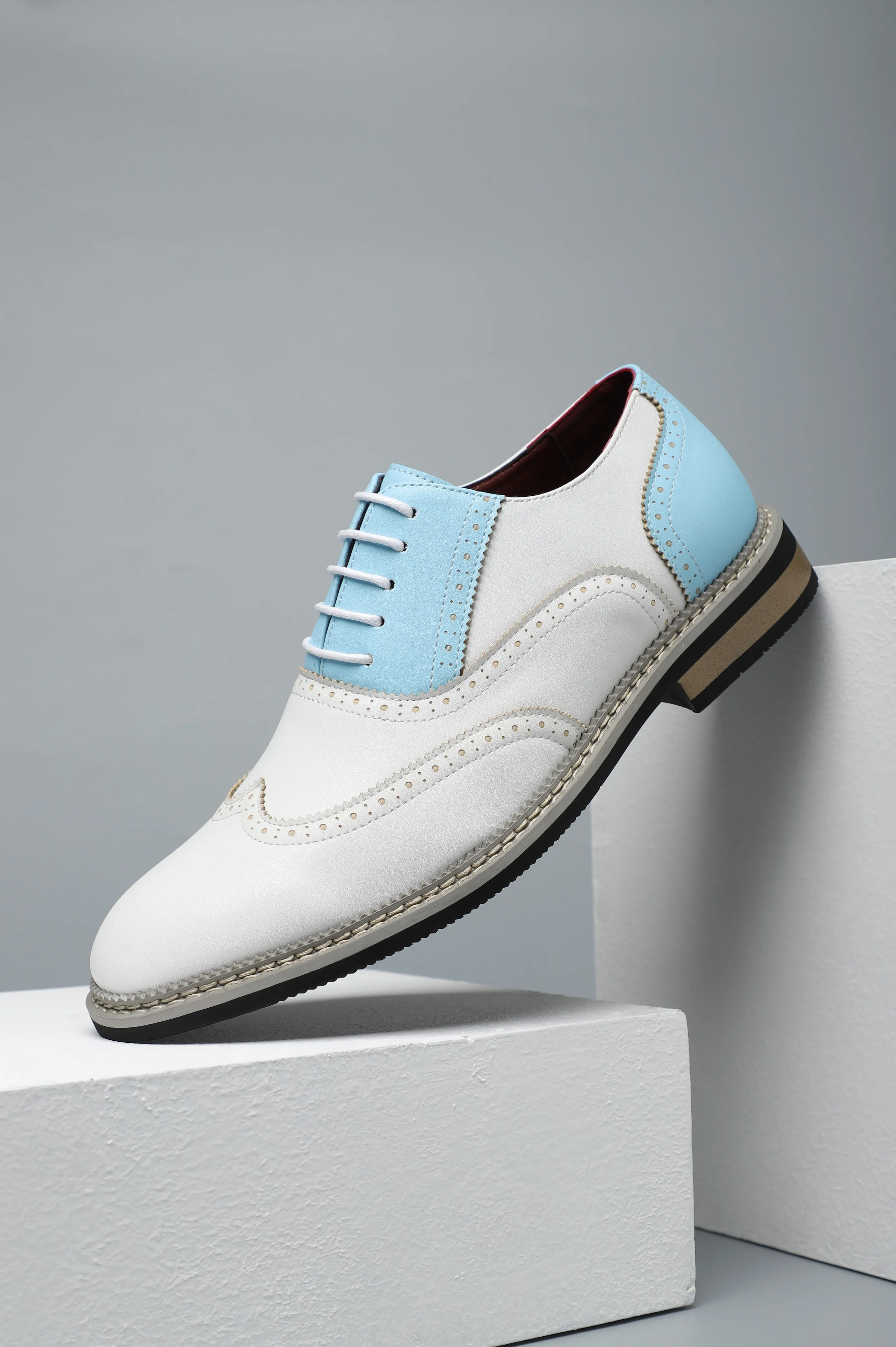

Light Blue Accent White Wingtip Dress Shoes