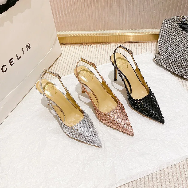 

Rhinestone high heels women's 2025 new one-word buckle strap bag head rear empty sandals women's stiletto