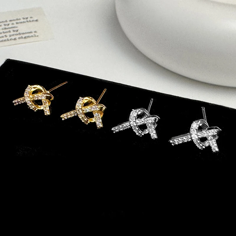 

PONYKISS Tibetan Silver 14K Gold Plated Zircon Knot Heart Stud Earrings for Women Cute Fashion Jewelry Sweet Cool Accessories