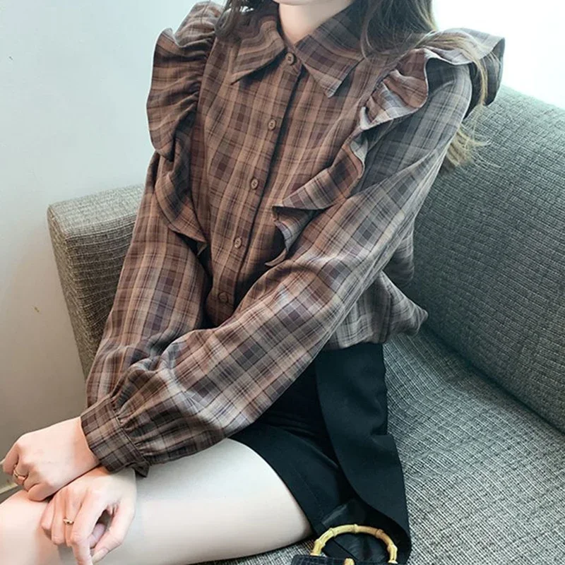 Lotus leaf shirt female autumn new retro fashion temperament casual loose plaid bubble sleeve gentle sweet long sleeve.